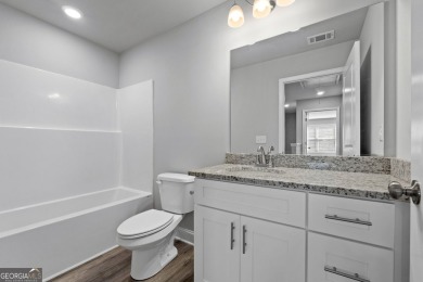Discover this stunning 3-bedroom, 2.5-bath home with a spacious on Turtle Cove Golf Course in Georgia - for sale on GolfHomes.com, golf home, golf lot
