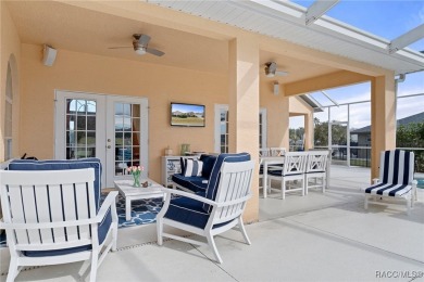 This immaculate home is located on the 5th hole at the Lakeside on LakeSide Country Club in Florida - for sale on GolfHomes.com, golf home, golf lot