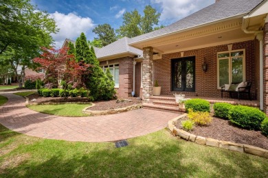 This stunning custom home on the prestigious Founder's Course of on Chenal Country Club - Bear Den Mountain in Arkansas - for sale on GolfHomes.com, golf home, golf lot