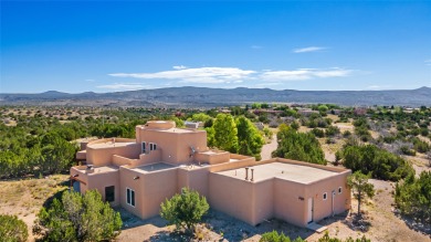 Views! This beautiful home, perched on the highest hill in on Pueblo de Cochiti Golf Course in New Mexico - for sale on GolfHomes.com, golf home, golf lot