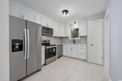 Welcome to this beautiful renovated 2 bed, 2 bath home, located on Myrtlewood Golf Course and Club  in South Carolina - for sale on GolfHomes.com, golf home, golf lot