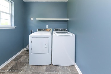 Welcome to this beautiful two- story 4 bedroom 2.5 bathroom home on Eagle Creek Golf Club and Grill in North Carolina - for sale on GolfHomes.com, golf home, golf lot