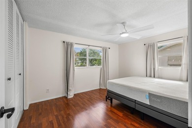 Welcome home to this updated, move-in ready Palm Harbor retreat on Highland Lakes Executive Golf Course in Florida - for sale on GolfHomes.com, golf home, golf lot