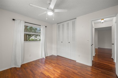 Welcome home to this updated, move-in ready Palm Harbor retreat on Highland Lakes Executive Golf Course in Florida - for sale on GolfHomes.com, golf home, golf lot