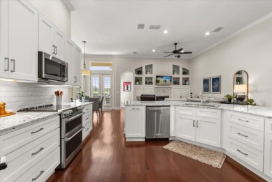 Welcome to this stunning lakefront home in the gated golf on Heathrow Country Club in Florida - for sale on GolfHomes.com, golf home, golf lot