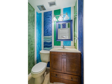 Welcome home to this updated, move-in ready Palm Harbor retreat on Highland Lakes Executive Golf Course in Florida - for sale on GolfHomes.com, golf home, golf lot