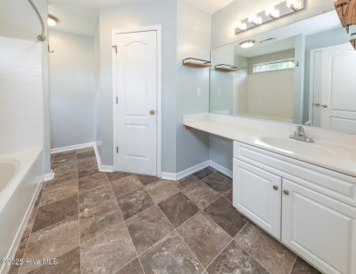 Welcome to this beautiful two- story 4 bedroom 2.5 bathroom home on Eagle Creek Golf Club and Grill in North Carolina - for sale on GolfHomes.com, golf home, golf lot