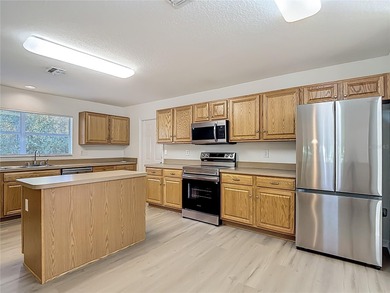 Welcome to this beautifully updated 4-bedroom, 3-bath home on Sugarmill Woods Golf and Country Club in Florida - for sale on GolfHomes.com, golf home, golf lot