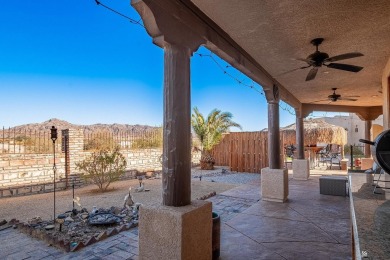 Nestled in the serene Foothills, this stunning custom-built home on Foothills Executive Golf Course in Arizona - for sale on GolfHomes.com, golf home, golf lot