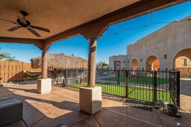 Nestled in the serene Foothills, this stunning custom-built home on Foothills Executive Golf Course in Arizona - for sale on GolfHomes.com, golf home, golf lot