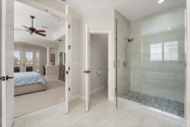 Welcome to this stunning lakefront home in the gated golf on Heathrow Country Club in Florida - for sale on GolfHomes.com, golf home, golf lot