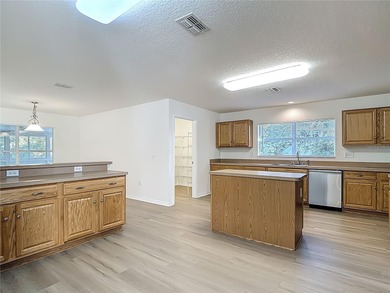 Welcome to this beautifully updated 4-bedroom, 3-bath home on Sugarmill Woods Golf and Country Club in Florida - for sale on GolfHomes.com, golf home, golf lot