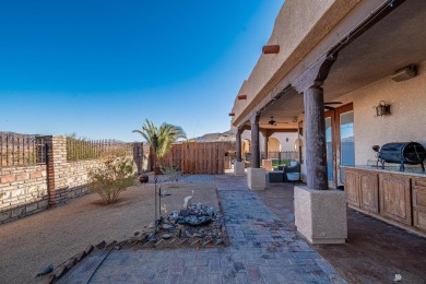 Nestled in the serene Foothills, this stunning custom-built home on Foothills Executive Golf Course in Arizona - for sale on GolfHomes.com, golf home, golf lot