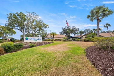 Welcome home to this updated, move-in ready Palm Harbor retreat on Highland Lakes Executive Golf Course in Florida - for sale on GolfHomes.com, golf home, golf lot