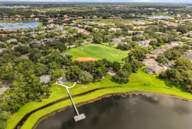 Welcome to this stunning lakefront home in the gated golf on Heathrow Country Club in Florida - for sale on GolfHomes.com, golf home, golf lot