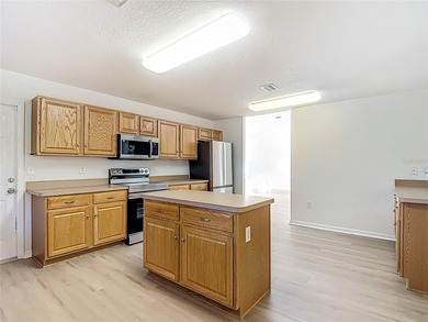 Welcome to this beautifully updated 4-bedroom, 3-bath home on Sugarmill Woods Golf and Country Club in Florida - for sale on GolfHomes.com, golf home, golf lot