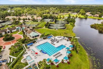 Welcome to this stunning lakefront home in the gated golf on Heathrow Country Club in Florida - for sale on GolfHomes.com, golf home, golf lot