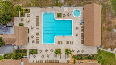 Welcome home to this updated, move-in ready Palm Harbor retreat on Highland Lakes Executive Golf Course in Florida - for sale on GolfHomes.com, golf home, golf lot