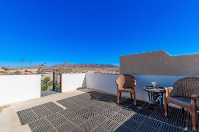 Nestled in the serene Foothills, this stunning custom-built home on Foothills Executive Golf Course in Arizona - for sale on GolfHomes.com, golf home, golf lot