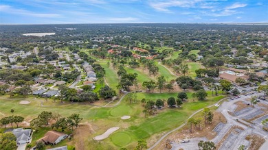 Welcome home to this updated, move-in ready Palm Harbor retreat on Highland Lakes Executive Golf Course in Florida - for sale on GolfHomes.com, golf home, golf lot