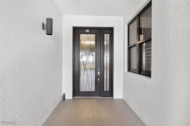 Enjoy refined waterfront living in the exclusive Palmas del Sol on Gulf Harbour Yacht and Country Club in Florida - for sale on GolfHomes.com, golf home, golf lot