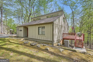 Welcome home to this beautiful contemporary with SEASONAL LAKE on The Highlands Course at Lake Arrowhead in Georgia - for sale on GolfHomes.com, golf home, golf lot