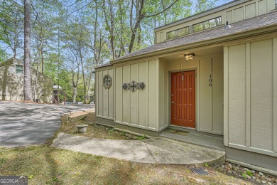 Welcome home to this beautiful contemporary with SEASONAL LAKE on The Highlands Course at Lake Arrowhead in Georgia - for sale on GolfHomes.com, golf home, golf lot