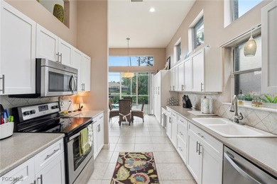 Step inside this beautifully maintained Brighton Model. This 2 on Estero Country Club in Florida - for sale on GolfHomes.com, golf home, golf lot