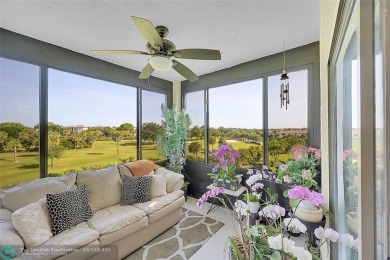 Top floor, corner unit featuring stunning views of the Golf on Boca Dunes Golf and Country Club in Florida - for sale on GolfHomes.com, golf home, golf lot
