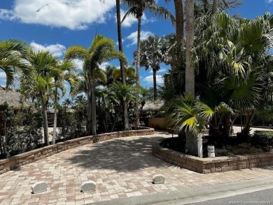 Nestled in the prestigious *millionaires row,* this magnificent on Motorcoach Resort Golf Course in Florida - for sale on GolfHomes.com, golf home, golf lot