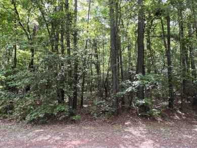 This .51 acres is located in the gated Woodlake Country Club on Woodlake Country Club in North Carolina - for sale on GolfHomes.com, golf home, golf lot