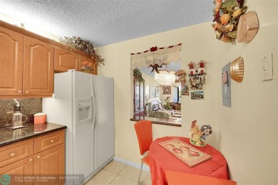 Top floor, corner unit featuring stunning views of the Golf on Boca Dunes Golf and Country Club in Florida - for sale on GolfHomes.com, golf home, golf lot