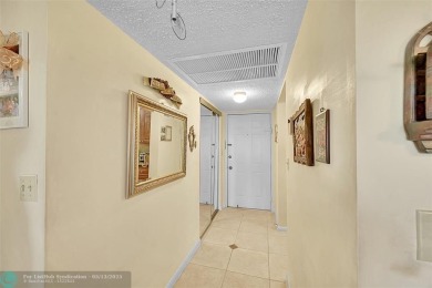 Top floor, corner unit featuring stunning views of the Golf on Boca Dunes Golf and Country Club in Florida - for sale on GolfHomes.com, golf home, golf lot