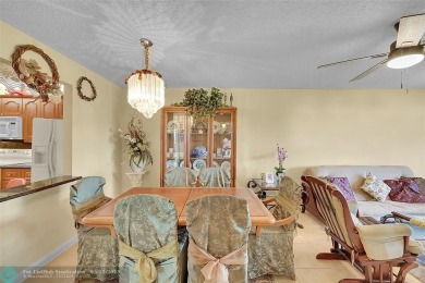 Top floor, corner unit featuring stunning views of the Golf on Boca Dunes Golf and Country Club in Florida - for sale on GolfHomes.com, golf home, golf lot