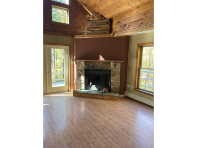 This serene Adirondack Chalet tucked back off the road has been on Malone Golf Club, Inc. in New York - for sale on GolfHomes.com, golf home, golf lot