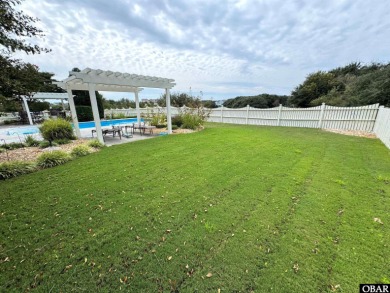 Welcome to 742 Hammock Lane, a stunning coastal retreat tucked on The Currituck Golf Club in North Carolina - for sale on GolfHomes.com, golf home, golf lot