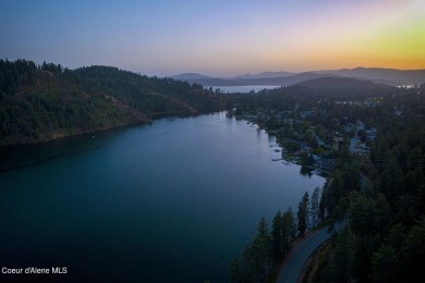 As you step outside, the serene lake surroundings take center on Ponderosa Springs Golf Course in Idaho - for sale on GolfHomes.com, golf home, golf lot