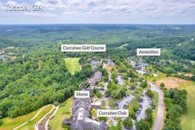 This pretty condo has sweeping views of a gorgeous treetop on Currahee Golf Club in Georgia - for sale on GolfHomes.com, golf home, golf lot