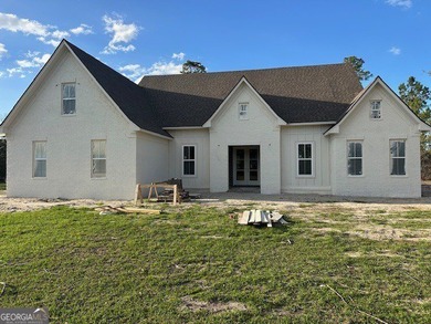 Welcome to this stunning new construction home in the on Kinderlou Forest Golf Club in Georgia - for sale on GolfHomes.com, golf home, golf lot