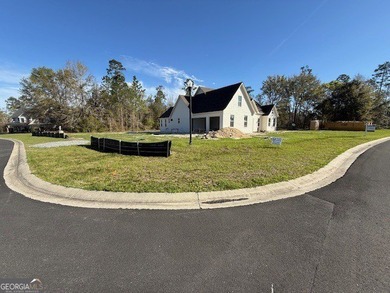Welcome to this stunning new construction home in the on Kinderlou Forest Golf Club in Georgia - for sale on GolfHomes.com, golf home, golf lot