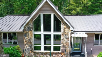 Welcome to this Charming ranch-style 3 Bedroom/2 Full Baths home on Alpine Lake Resort in West Virginia - for sale on GolfHomes.com, golf home, golf lot