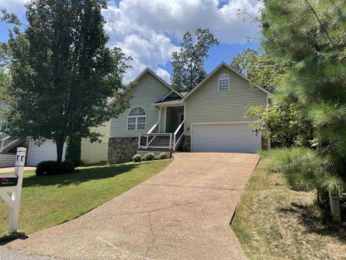 Owner has priced this charming three-bedroom, two-bath home to on Shiloh Falls Golf Club in Tennessee - for sale on GolfHomes.com, golf home, golf lot