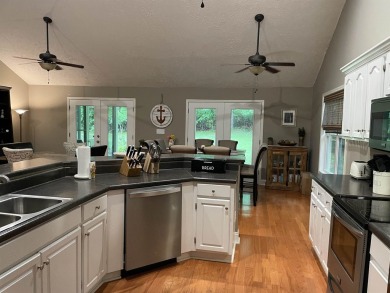 Owner has priced this charming three-bedroom, two-bath home to on Shiloh Falls Golf Club in Tennessee - for sale on GolfHomes.com, golf home, golf lot
