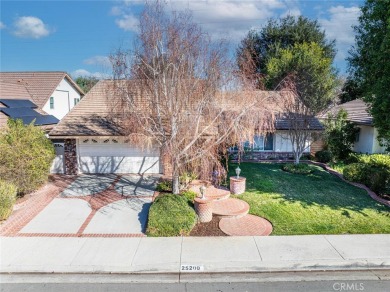 Old Orchard single story in the heart of Valencia. Tile flooring on Vista Valencia Golf Course in California - for sale on GolfHomes.com, golf home, golf lot