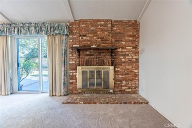 Old Orchard single story in the heart of Valencia. Tile flooring on Vista Valencia Golf Course in California - for sale on GolfHomes.com, golf home, golf lot