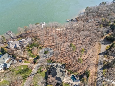 Do not miss out on this incredible lakefront peninsula lot on Trump National Golf Club Charlotte in North Carolina - for sale on GolfHomes.com, golf home, golf lot