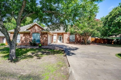 Custom Home in Pecan Plantation. Spacious Living room with wall on Pecan Plantation Country Club in Texas - for sale on GolfHomes.com, golf home, golf lot