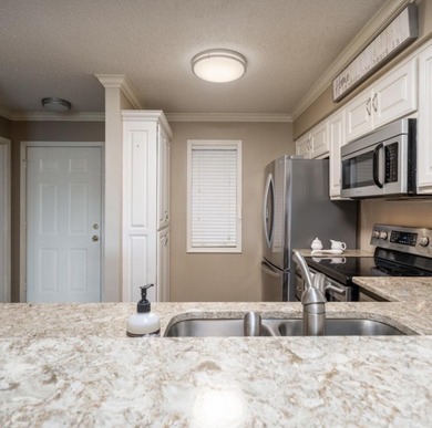 Turnkey ground floor 2 br/2 ba condo in Diamondhead Manor just on Diamondhead Golf and Country Club in Arkansas - for sale on GolfHomes.com, golf home, golf lot