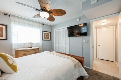 Paradise awaits you this second floor, 2 bed, 2 bath with on Royal Palm Golf Club in Florida - for sale on GolfHomes.com, golf home, golf lot