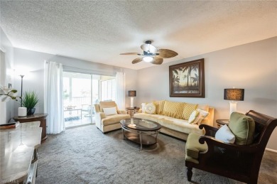 Paradise awaits you this second floor, 2 bed, 2 bath with on Royal Palm Golf Club in Florida - for sale on GolfHomes.com, golf home, golf lot